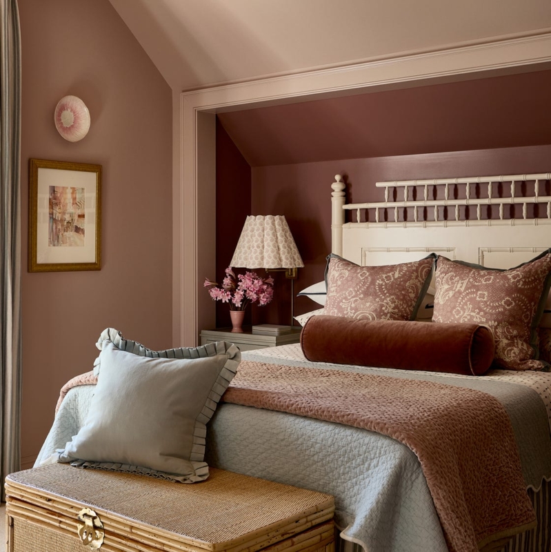 Dusty Rose Bedroom Alcove with Woven Trunk Storage