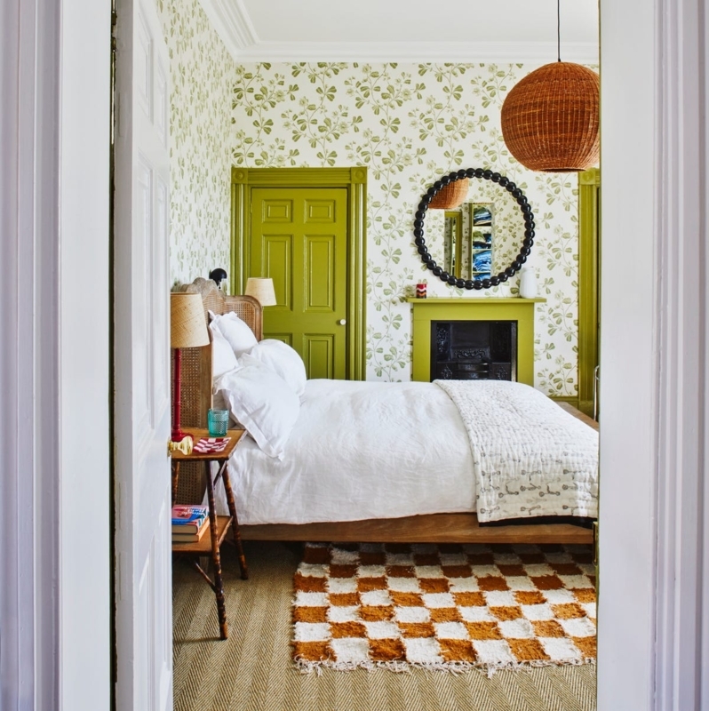 Eclectic Bedroom Design: Floral Vine Wallpaper, Checkerboard Rug.