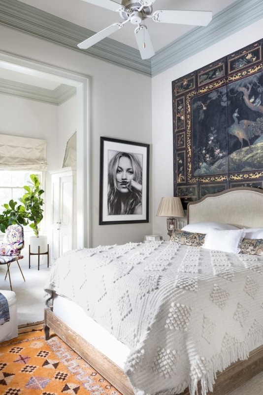 Eclectic Bedroom with Chinoiserie Screen and Textured Pom Pom Throw
