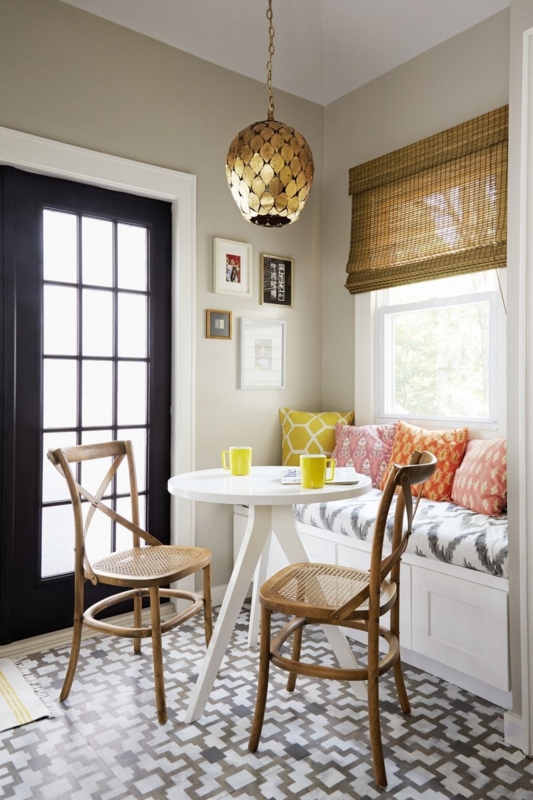 Eclectic Breakfast Nook: Built-in Window Bench & Geometric Floor Tile