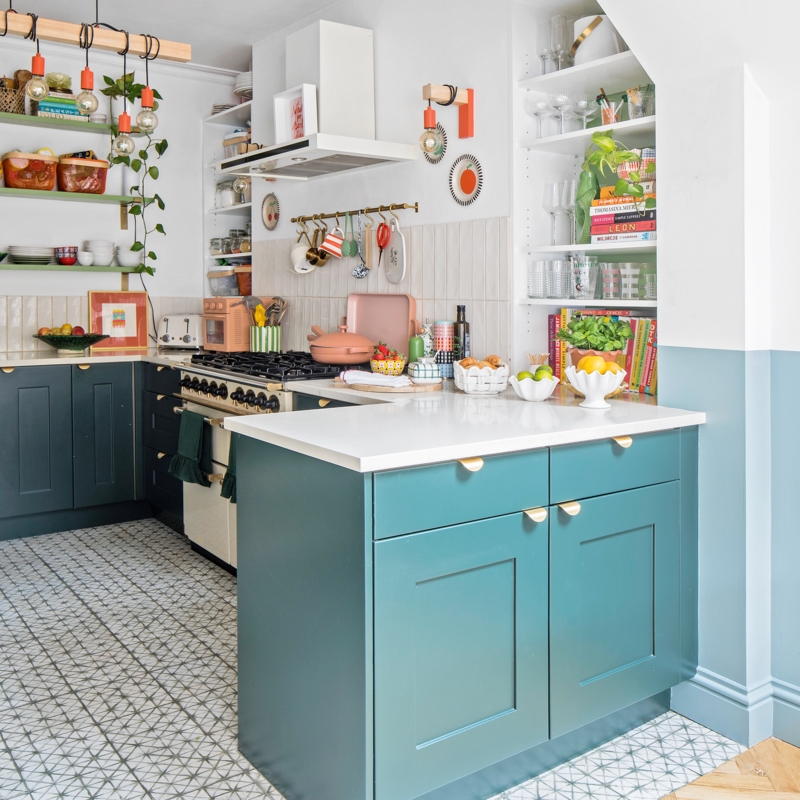 Eclectic Kitchen with Teal Cabinets and Starburst Floor Tiles