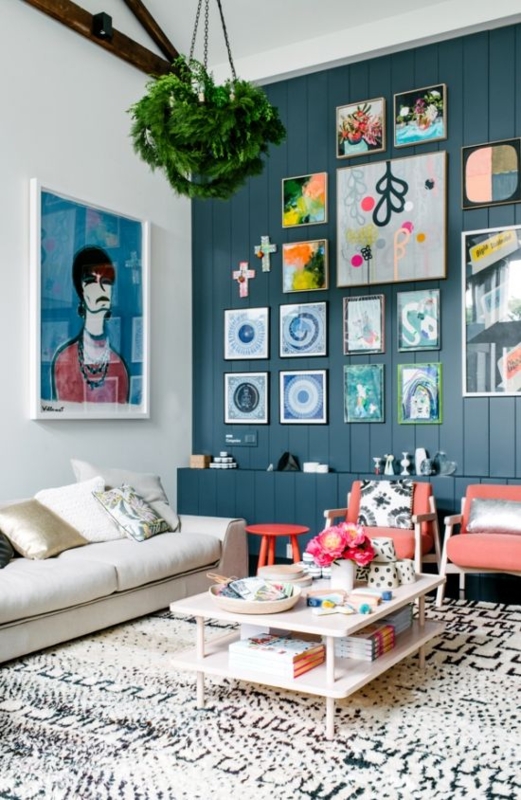 Eclectic Living Room featuring Teal Paneling & Curated Gallery Wall