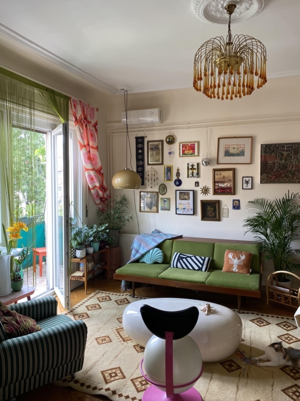 Eclectic Living Room Gallery Wall & Organic White Coffee Table
