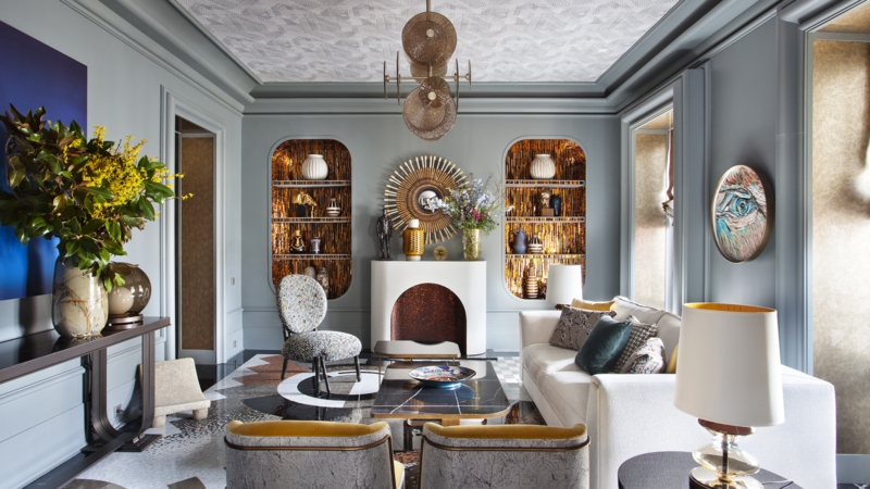 Eclectic Living Room with Gold-Lined Arched Niches and Patterned Ceiling