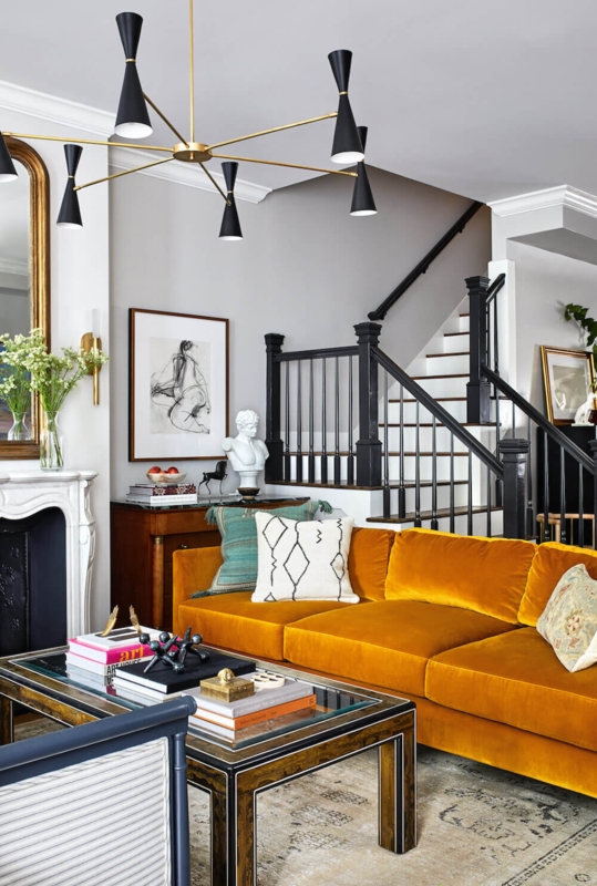 Eclectic Living Room with Ochre Velvet Sofa and Sculptural Lighting