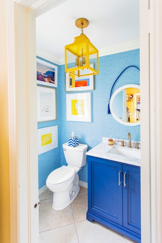 Eclectic Powder Room with Yellow Lantern Pendant and Blue Wallpaper