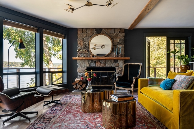 Eclectic Rustic Living Room with Yellow Velvet Sofa and Stone Fireplace