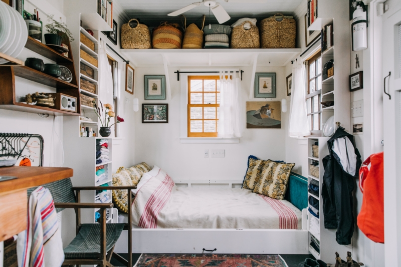 Eclectic Tiny House Bedroom With Overhead Basket Shelf Storage
