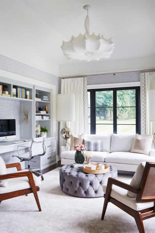 Elegant Living Room with Office Nook & Oversized Tufted Ottoman