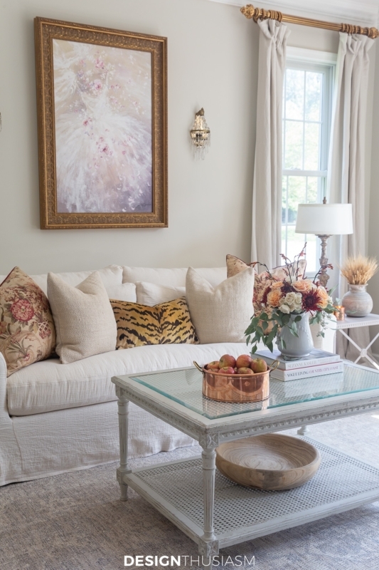 Elegant Living Room with White Slipcovered Sofa and Tiger Print Accents