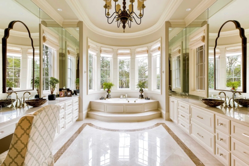 Elegant Traditional Master Bath featuring Bay Window Soaking Tub
