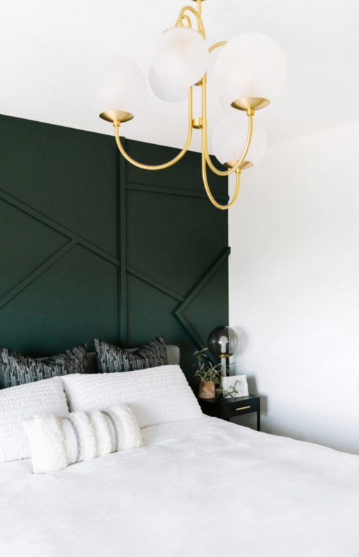 Emerald Green Bedroom with Geometric Trim and Gold Globe Chandelier