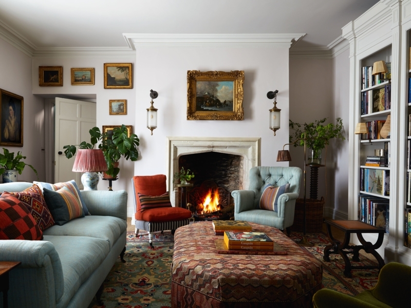 English Country Living Room Decor with Kilim Ottoman and Gallery Wall