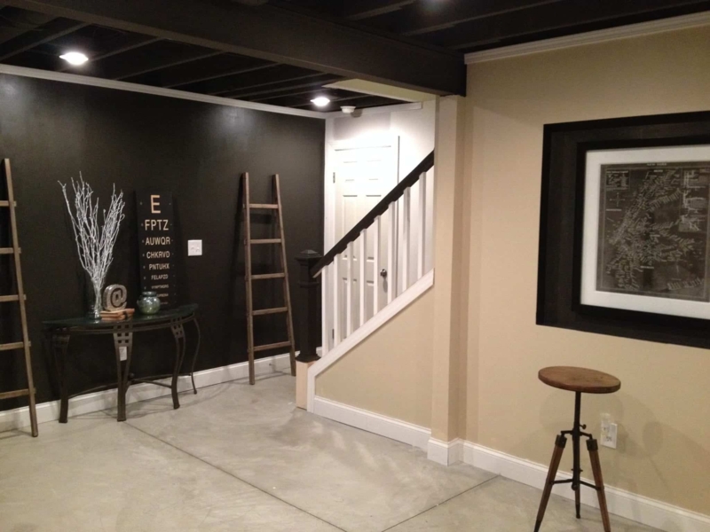 Entryway Nook with Charcoal Accent Wall styling and Decorative Ladder