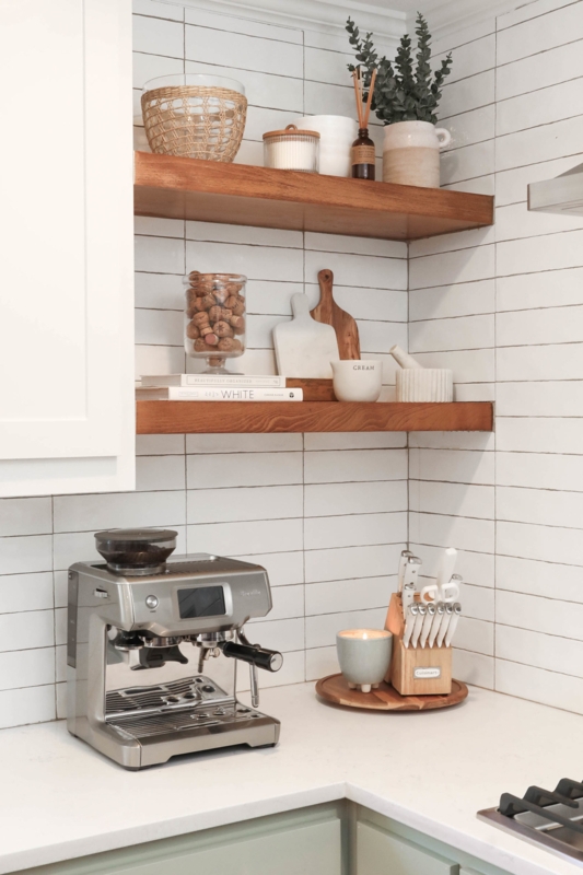 Espresso Machine on Counter below Thick Wood Floating Shelves