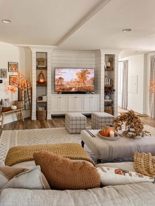 Fall Basement Decor with White Shiplap Built-Ins and Plaid Ottomans