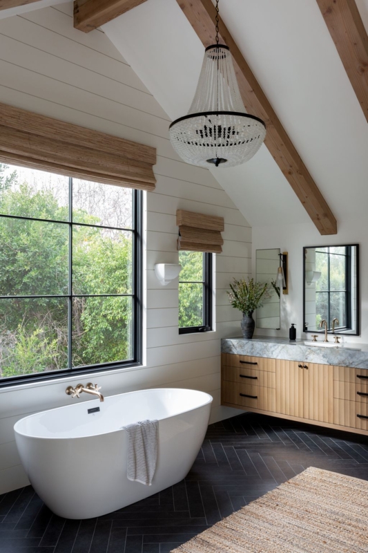 Farmhouse Bathroom featuring Slatted Floating Vanity and Vaulted Ceiling