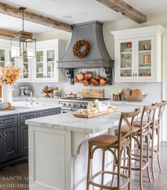 Farmhouse Kitchen Fall Decor with Copper Pots and Wood Beams