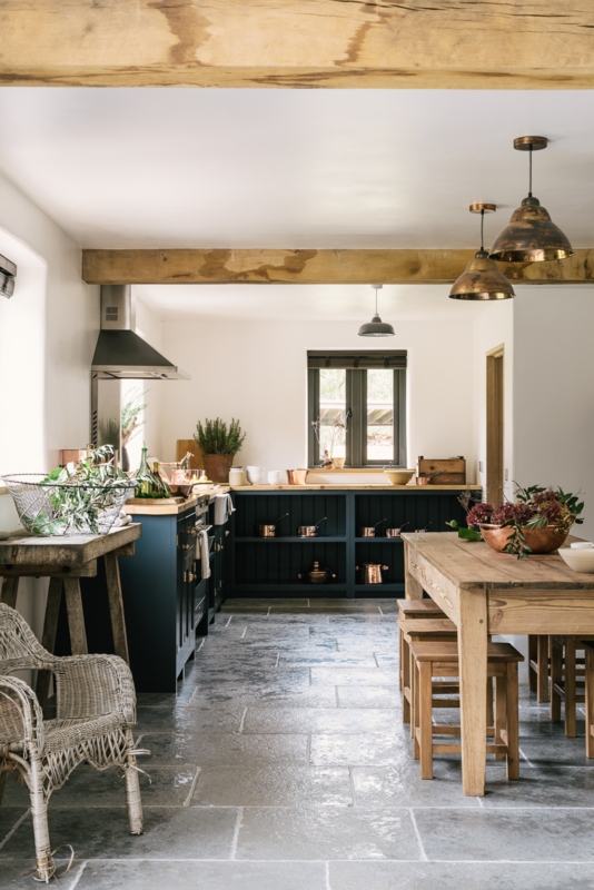 Farmhouse Kitchen with Stone Flagstone Flooring and Exposed Timber Beams