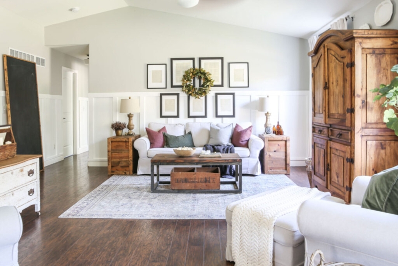 Farmhouse Living Room with Board & Batten Wainscoting & Tall Armoire