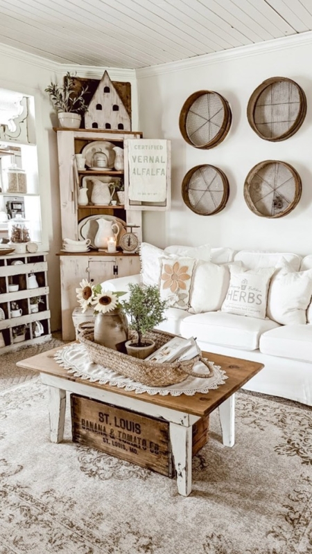 Farmhouse Living Room with Distressed Hutch & Vintage Decor