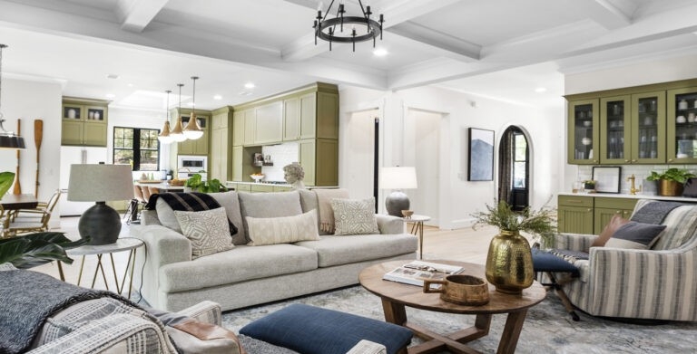 Farmhouse Living Room with Olive Green Kitchen & White Beamed Ceiling