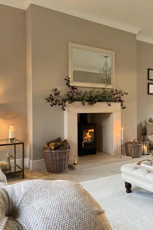 Farmhouse Living Room with Wood Burning Stove and Wicker Baskets