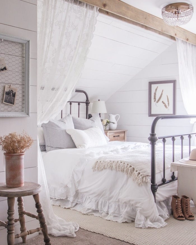 Farmhouse Metal Bed Frame in Attic Bedroom with Lace Canopy Drape