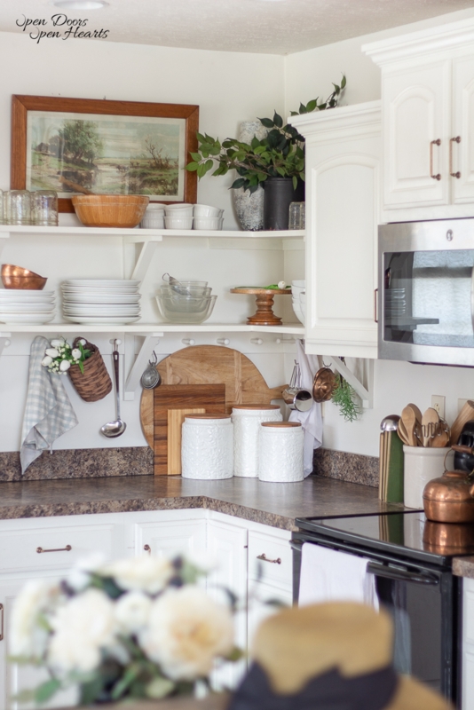 Farmhouse Open Shelving with Textured Canisters and Cutting Boards