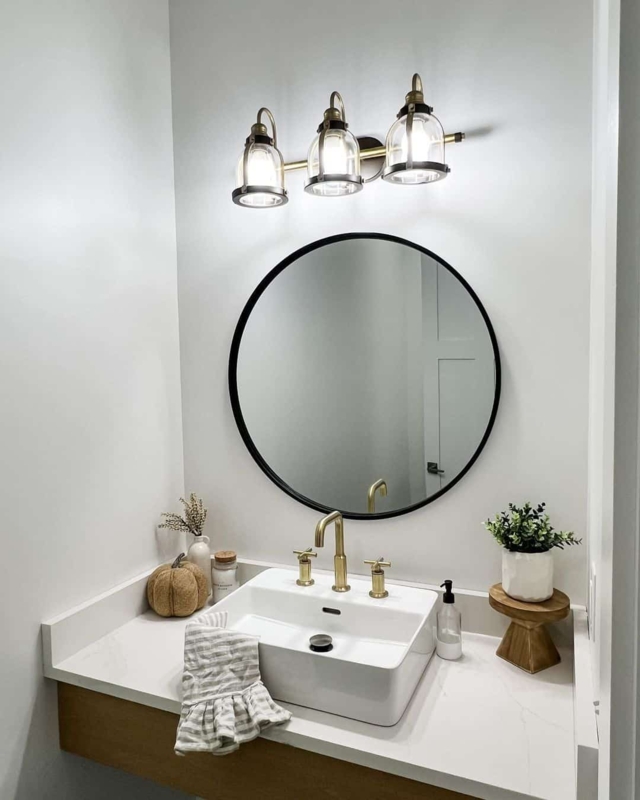 Farmhouse Vanity with Round Black Mirror and Brass Faucets