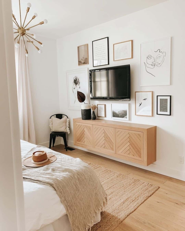 Floating Media Console with Herringbone Doors and Gallery Wall Layout