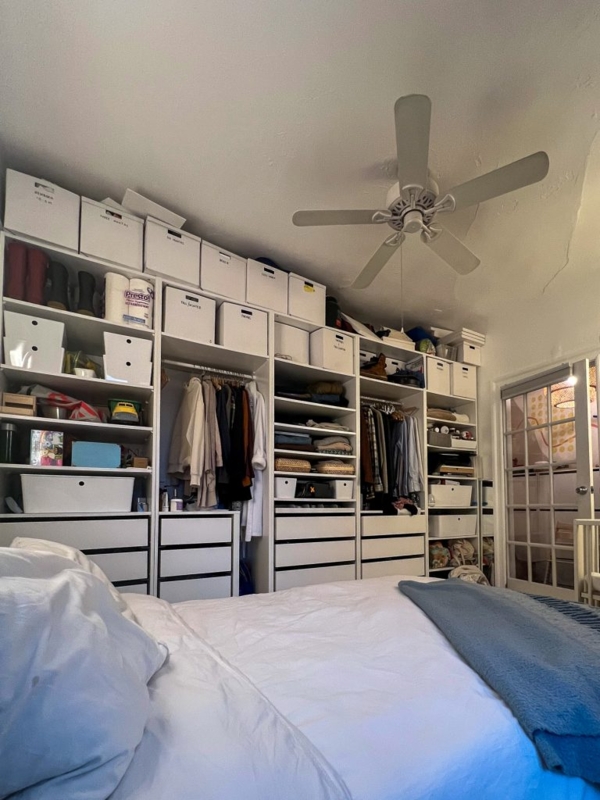 Floor To Ceiling Modular Shelving System With Integrated Drawers