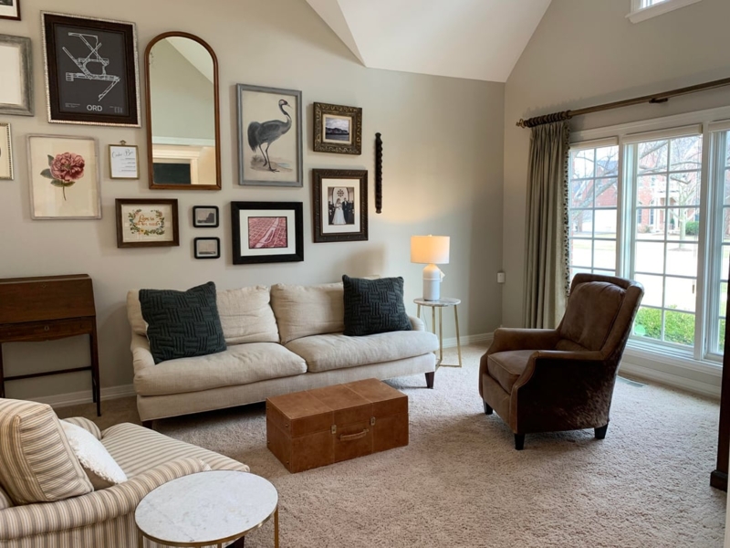 Formal Living Room with Eclectic Gallery Wall & Trunk Coffee Table