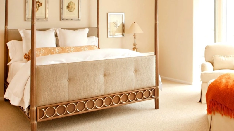 Four Poster Bed with Tufted Footboard and Circular Frame Detailing