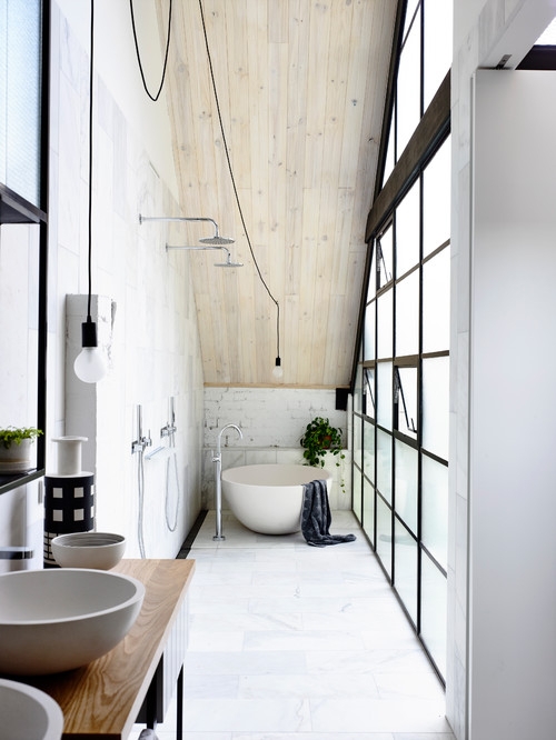 Freestanding Tub in Narrow Loft with Vaulted Wood Ceiling