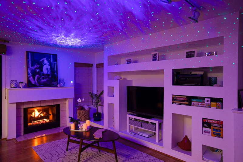 Galaxy Projector and Fireplace with Built-in Shelving