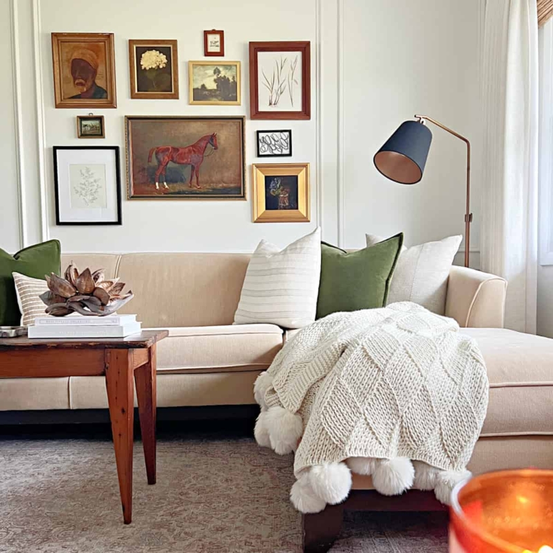 Gallery Wall over Sectional Sofa with Textured Pom Pom Blanket
