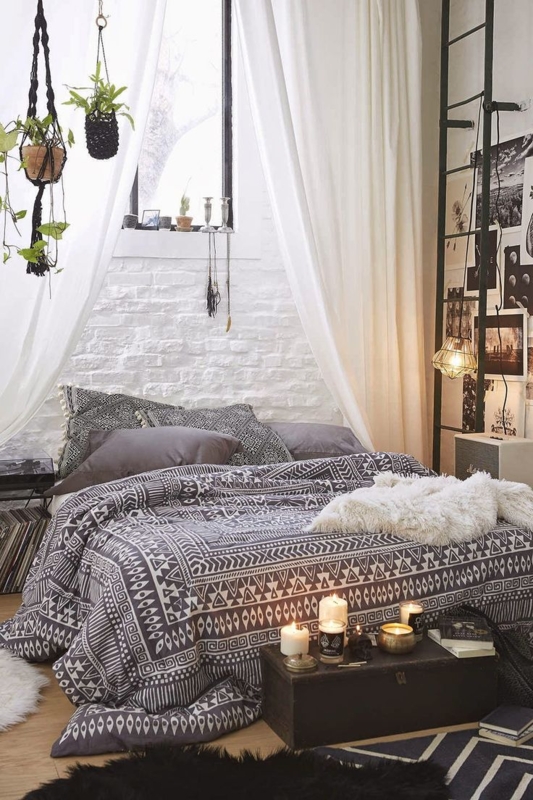 Geometric Bedding Set Against White Brick Accent Wall