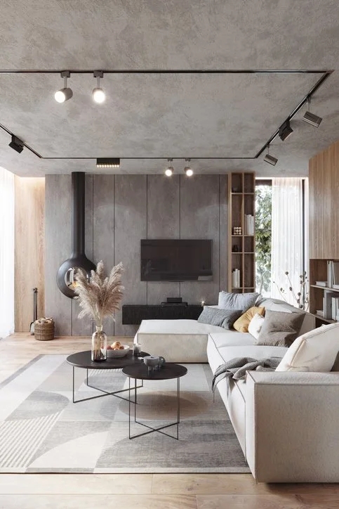Geometric Black Track Lighting and Concrete Ceiling