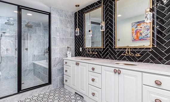 Glam Bathroom: Black Herringbone Backsplash & Hexagonal Floor Tile