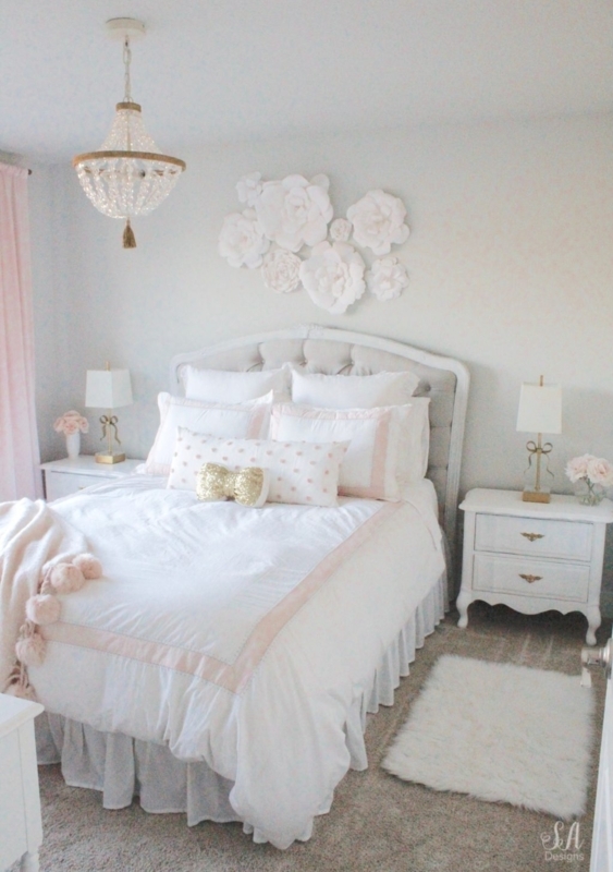 Glam Blush Bedroom with Tufted Bed and Paper Flower Decor