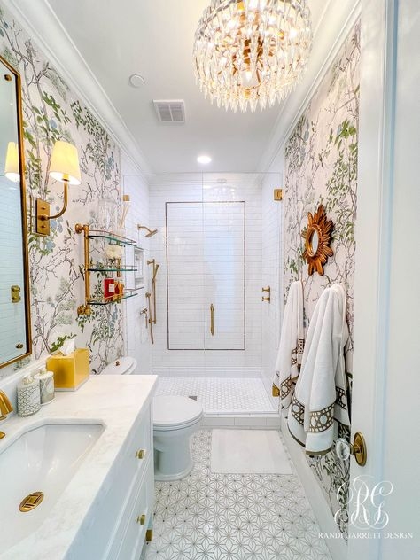 Glam Guest Bathroom with Floral Wallpaper and Crystal Chandelier