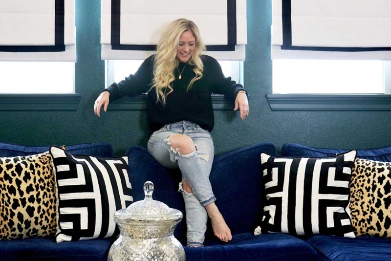 Glam Sofa with Dark Green Walls and Leopard Print Accents