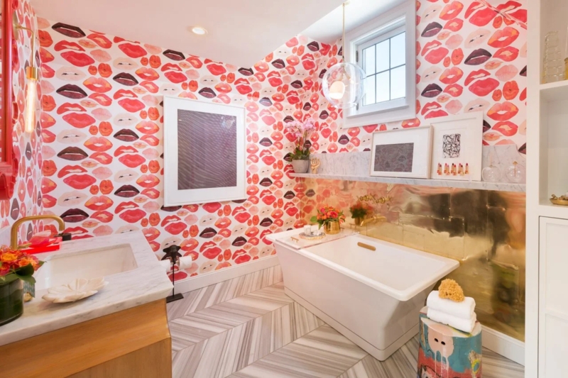 Glam Teen Bathroom with bold lip print wallpaper and metallic backsplash.