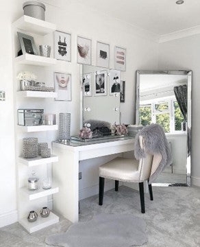 Glam Vanity Table with Tiered Floating Shelves and Silver Accents