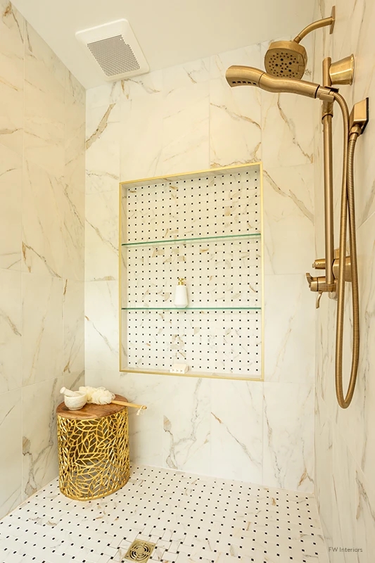 Glam Walk-In Shower with Gold Fixtures and Recessed Niche Shelving