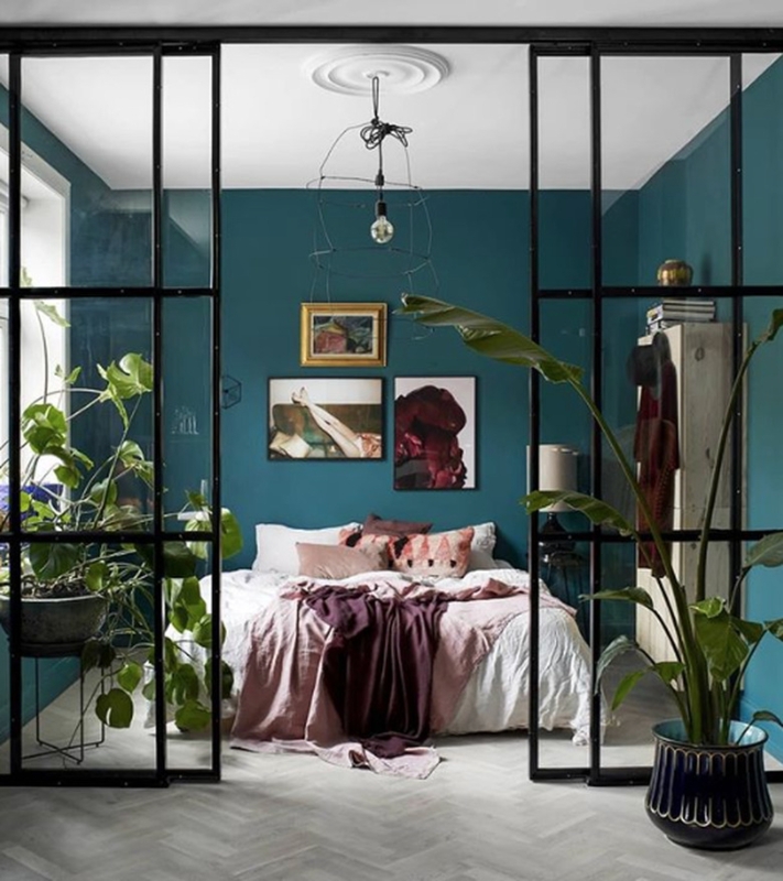 Glass Partition Bedroom Wall with Herringbone Wood Flooring