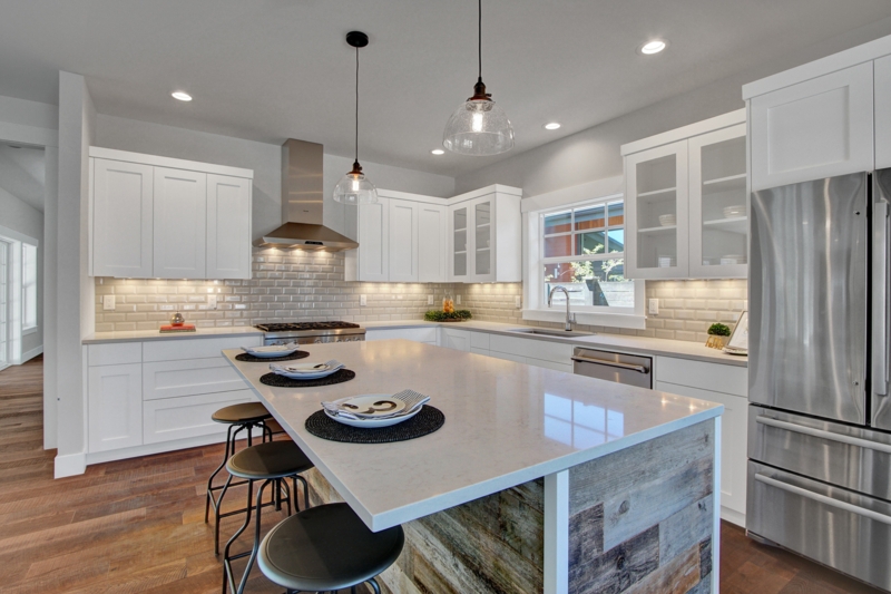 Glass Pendant Kitchen Lighting Above Rustic Reclaimed Wood Island