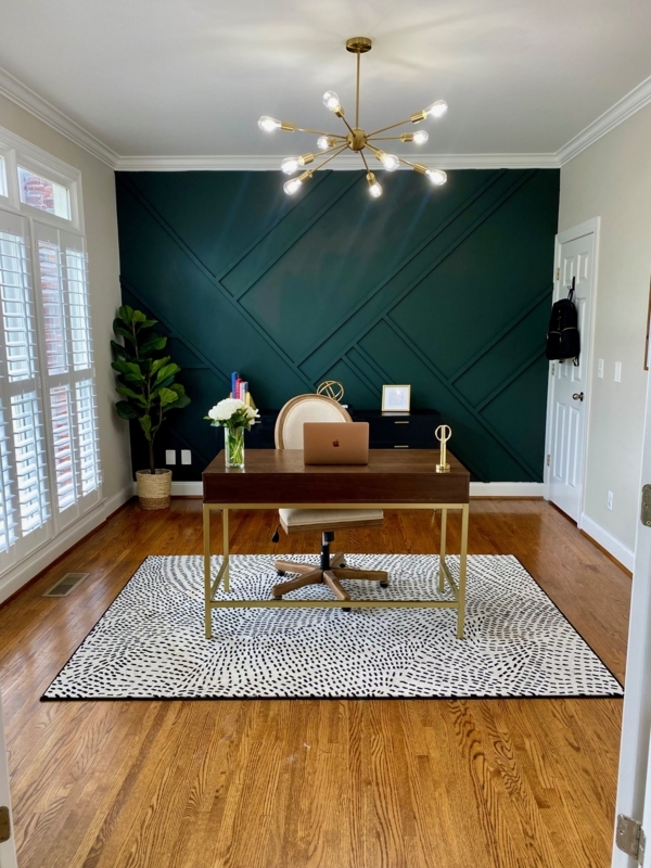 Gold-Leg Writing Desk with Bold Dotted Rug and Green Geometric Molding
