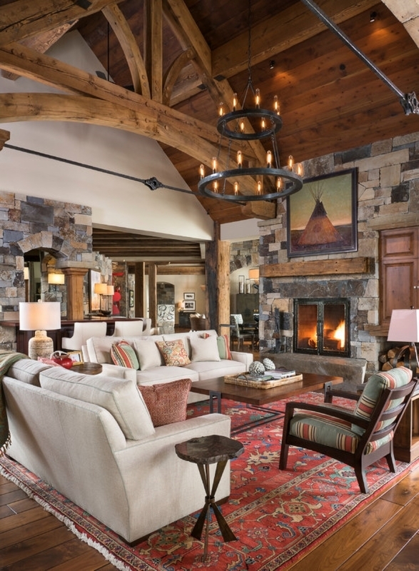 Grand Rustic Lodge Design with Heavy Timber Trusses and Stone Fireplace